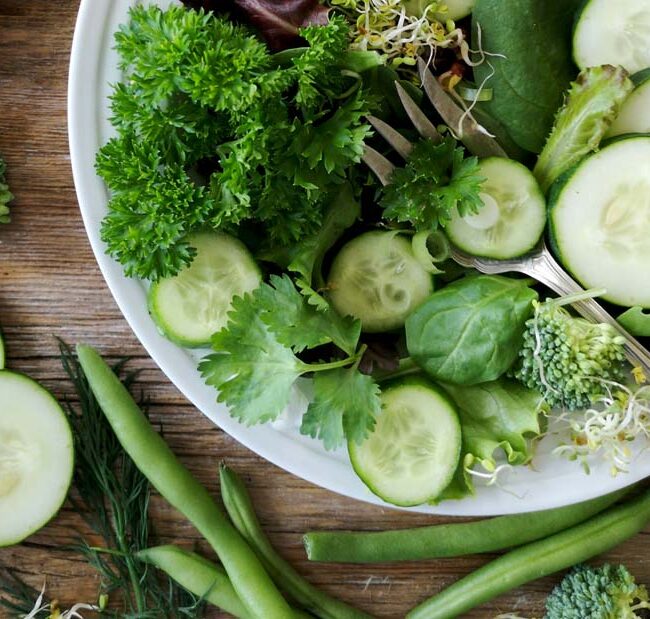 salad greens with kapha vegetables like broccoli, zucchini and green beans