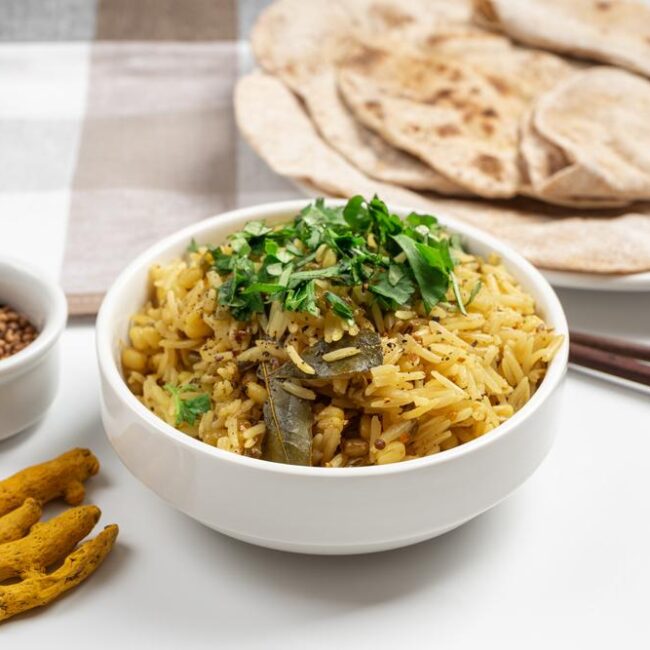 A bowl of kitchari on a table.