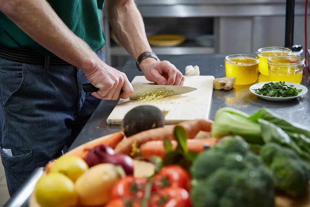 A chef prepares fresh Ayurvedic cuisine.
