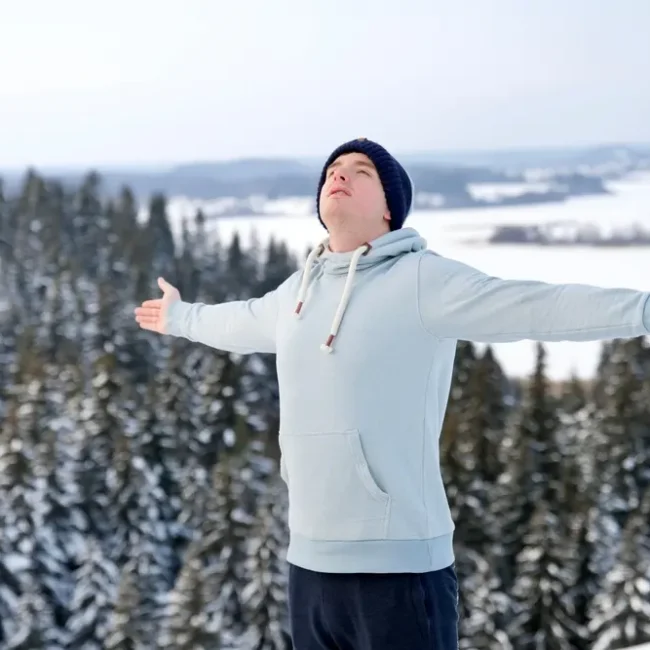 A young man experiences kapha season in the tree-studded mountains.